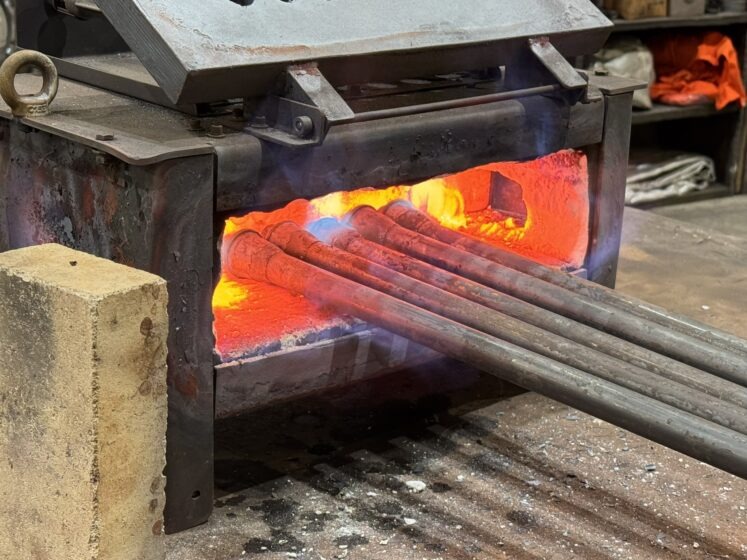 The crown stay-bolts going through the annealing process