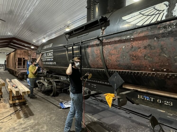Our crew sanding the car