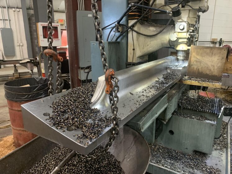 Machining the male die needed to form the top funnel of the outside syphons.