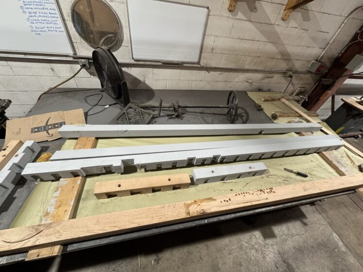 While the sanding is going on, we made new wood braces for the car's frame
